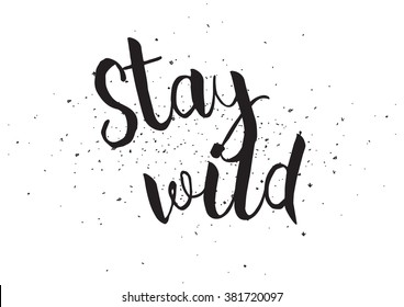 Stay wild inscription. Greeting card with calligraphy. Hand drawn design. Black and white. Usable as photo overlay.