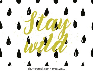 Stay wild inscription. Greeting card with calligraphy. Hand drawn lettering design. Photo overlay. Typography for banner, poster or apparel design. Isolated vector element.
