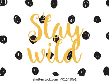 Stay wild inspirational inscription. Greeting card with calligraphy. Hand drawn lettering design. Photo overlay. Typography for banner, poster or apparel design. Vector typography.