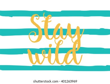 Stay wild inspirational inscription. Greeting card with calligraphy. Hand drawn lettering design. Photo overlay. Typography for banner, poster or apparel design. Vector typography.