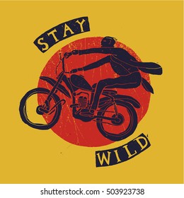 stay wild mad motorcycle  rider print. red and yellow and blue handwriting.