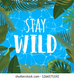 Stay wild message on marine background. Pool surface, coconut coctail, inflatable rings, umbrella, watermelon and palm trees, beach top view.