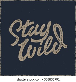 Stay Wild Old school Hand Drawn t Shirt Fashion Print Apparel Graphics. Retro Typographic Custom Quote Design. Textured Stamp effect. Vintage Americana Style Original Lettering. Vector Illustration. 