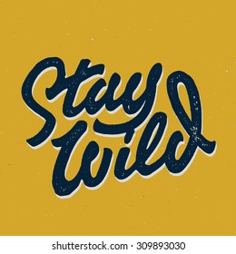 Stay Wild Old school Hand Drawn t Shirt Fashion Print Apparel Graphics. Retro Typographic Custom Quote Design. Textured Stamp effect. Vintage Americana Style Original Lettering. Vector Illustration. 