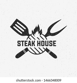 Steak House, barbecue restaurant logo, poster. BBQ trendy logo with barbecue grill , spatula and grill fork