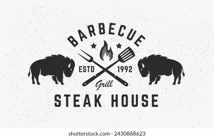 Steak House, barbecue restaurant logo, poster. BBQ trendy logo with spatula, grill fork and Bison silhouette. Vector emblem template.