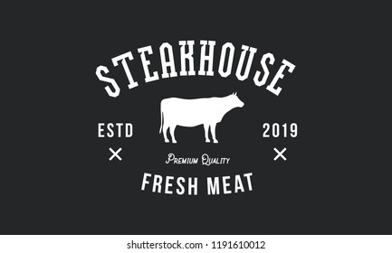 Steak House logo. Vintage design. Cow silhouette. Grill Restaurant emblem. Vector 