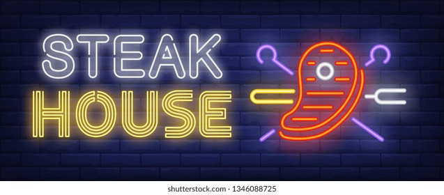 Steak house neon text, beef steak with crossed skewers and fork. Meat cooking and barbeque design. Night bright neon sign, colorful billboard, light banner. Vector illustration in neon style.