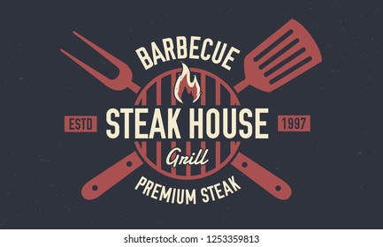 Steak House - vintage logo concept. Emblem of Steak House, barbecue restaurant with barbecue grill, spatula and grill fork. Retro poster for shop, restaurant. Vector Steak House logo template. 