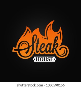 Steak logo flame vintage lettering. Grill fire on black background