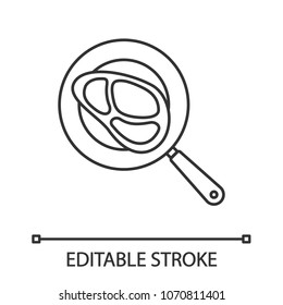 Steak on frying pan linear icon. Thin line illustration. Cooking beefsteak. Contour symbol. Vector isolated drawing. Editable stroke