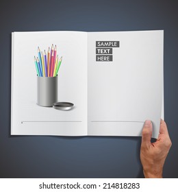 Steel box with crayons printed on book