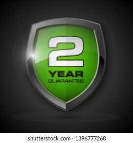 Steel shield with text guarantee two year icon. Warranty 2 year Label obligations. Safeguard metal shield sign. Protect promise reliability badge. Security guaranteed two year shield illustration