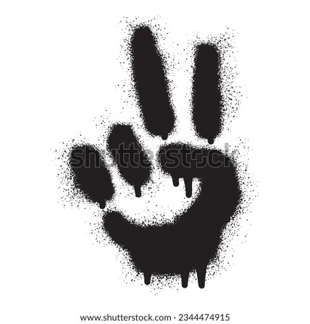 Stencil graffiti hand gesture V sign for peace symbol with black spray paint
