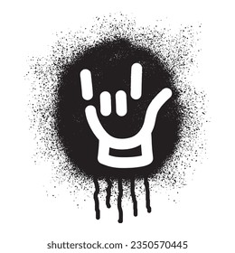 Stencil graffiti Rock n roll three finger hand gesture with black spray paint	
