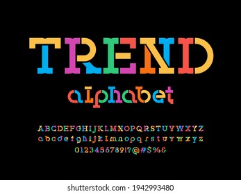 stencil style alphabet design with uppercase, lowercase, numbers and symbols