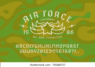 Stencil-plate sans serif font and air force emblem. Letters and numbers with rough texture for logo and t-shirt design. Print on camouflage background
