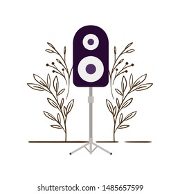 stereo speaker with branches and leaves in the background