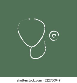 Stethoscope hand drawn in chalk on a blackboard vector white icon isolated on a green background.