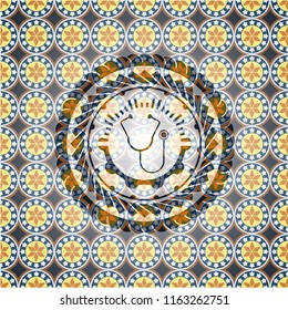 stethoscope icon inside arabesque emblem background. arabic decoration.