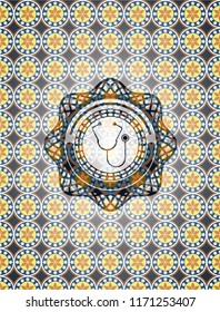 stethoscope icon inside arabic emblem background. Arabesque decoration.