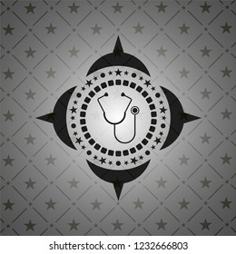 stethoscope icon inside black emblem