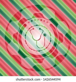 stethoscope icon inside christmas colors badge.