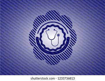 stethoscope icon inside emblem with jean background