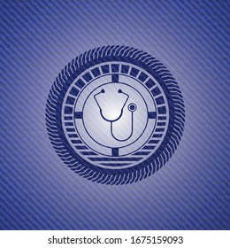 stethoscope icon inside emblem with jean texture