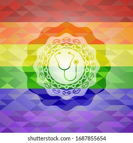 stethoscope icon inside emblem on mosaic background with the colors of the LGBT flag