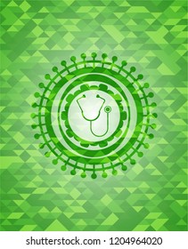 stethoscope icon inside green emblem. Mosaic background