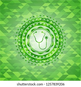 stethoscope icon inside green emblem with mosaic ecological style background