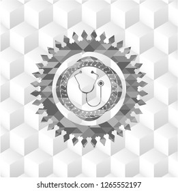 stethoscope icon inside grey badge with geometric cube white background
