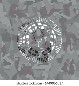stethoscope icon inside grey camouflage texture