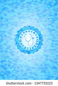 stethoscope icon inside light blue mosaic emblem