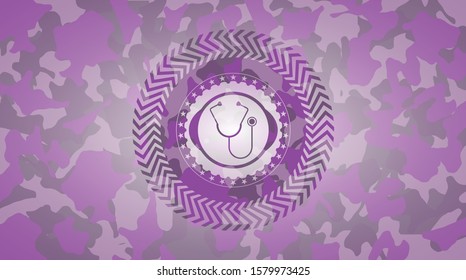stethoscope icon inside pink camouflaged emblem