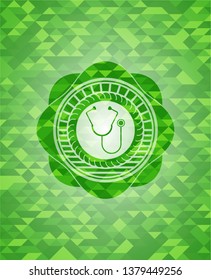 stethoscope icon inside realistic green emblem. Mosaic background