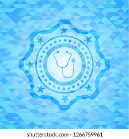 stethoscope icon inside realistic sky blue mosaic emblem