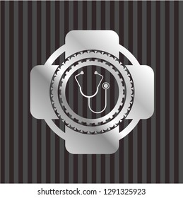 stethoscope icon inside silver badge or emblem