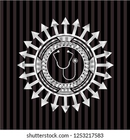 stethoscope icon inside silver emblem or badge
