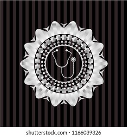stethoscope icon inside silver shiny badge