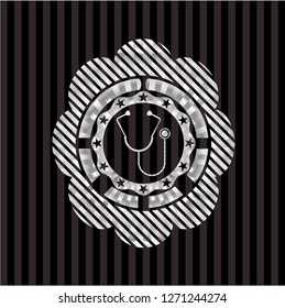 stethoscope icon inside silvery shiny emblem