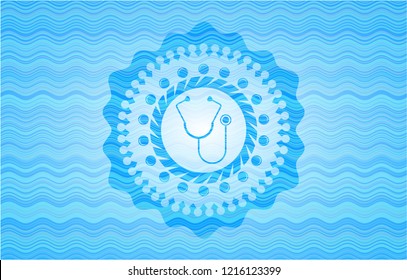 stethoscope icon inside sky blue water wave emblem background.