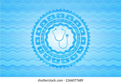 stethoscope icon inside water wave representation emblem background.