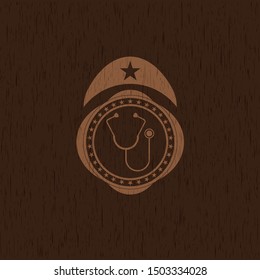 stethoscope icon inside wood emblem. Vintage.