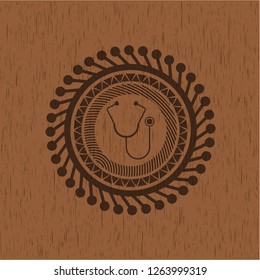 stethoscope icon inside wooden emblem. Retro