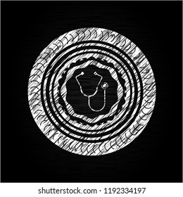 stethoscope icon on chalkboard