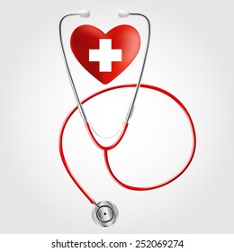 Stethoscope in a realistic style and heart with a cross.