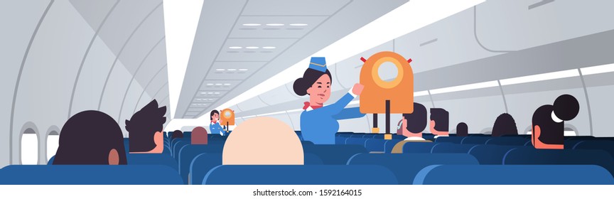 stewardess explaining for passengers how to use jacket life vest in emergency situation female flight attendants safety demonstration concept modern airplane board interior horizontal portrait vector