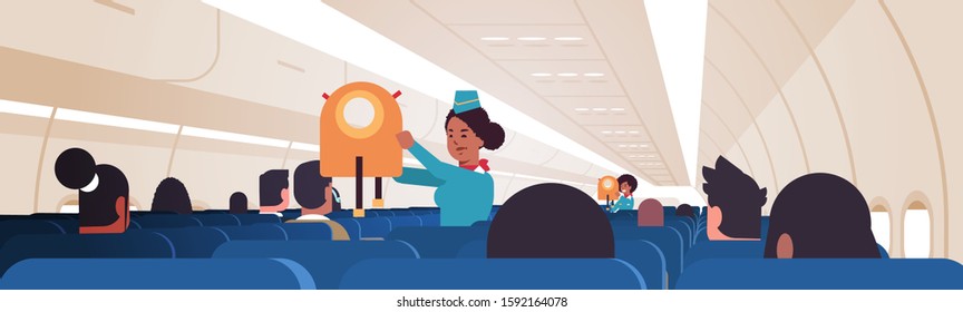 stewardess explaining for passengers how to use jacket life vest in emergency situation african american flight attendants safety demonstration concept modern airplane board interior horizontal vector